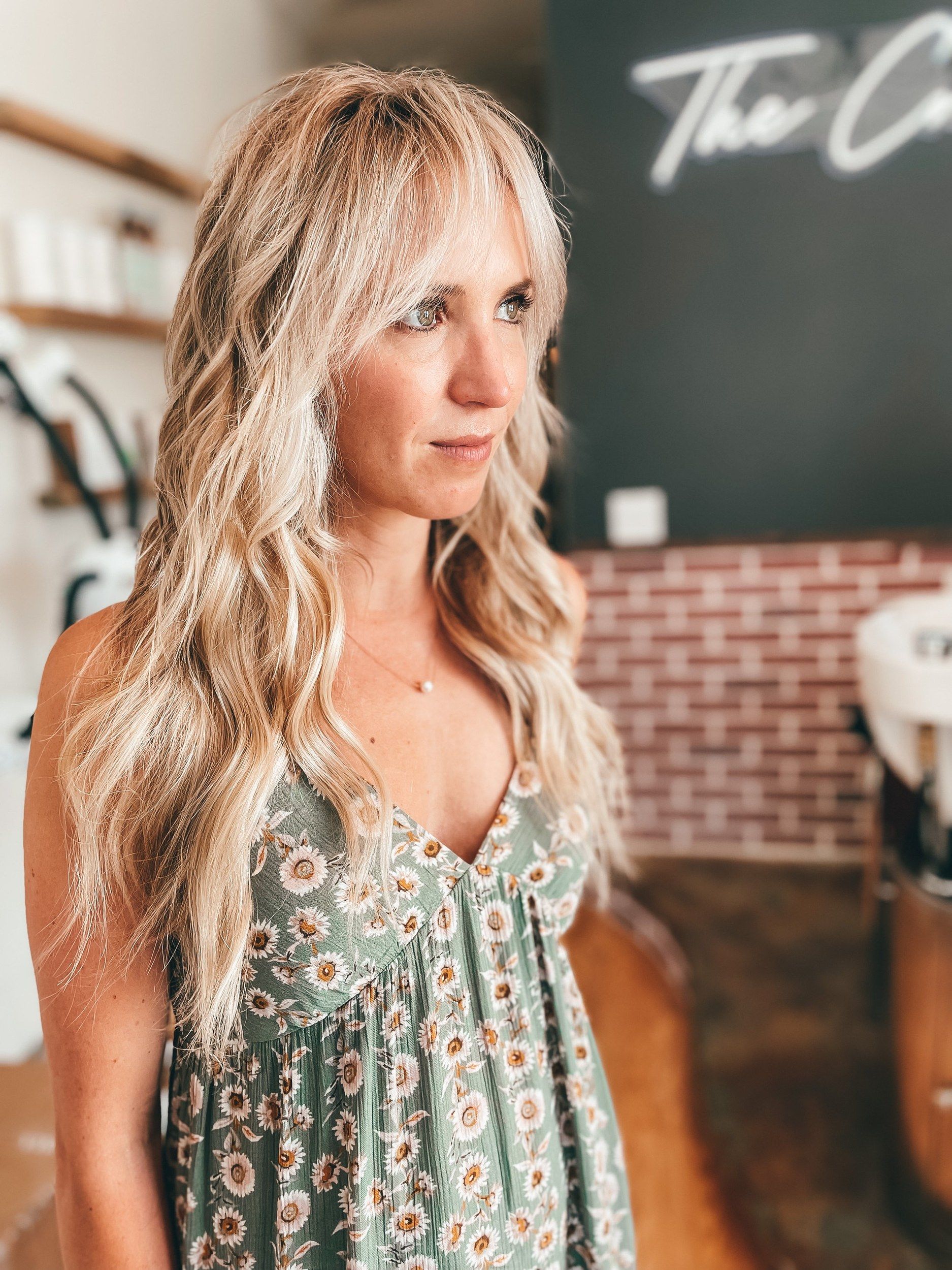 Long blonde waves styled at The Craft Collective
