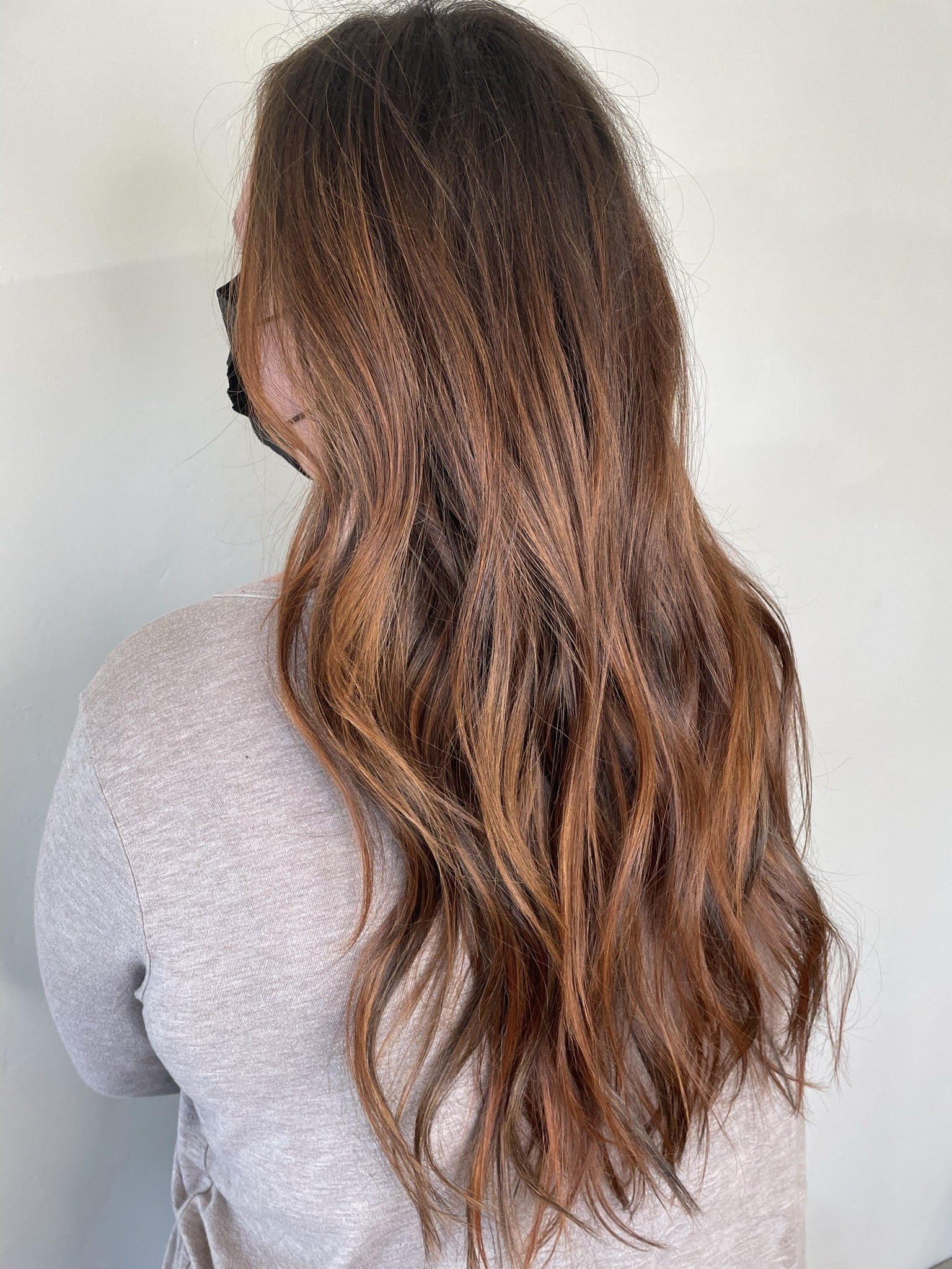 Long brunette hair with extensions, from behind